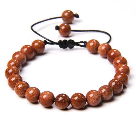 Yoga-Armband aus hochwertigem Seil mit 8mm Perlen und verstellbarem Schnürverschluss auf weißem Hintergrund
